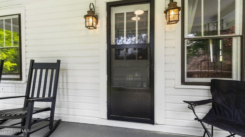 Discover a rare opportunity to own a charming 1940s mountain - photo 16