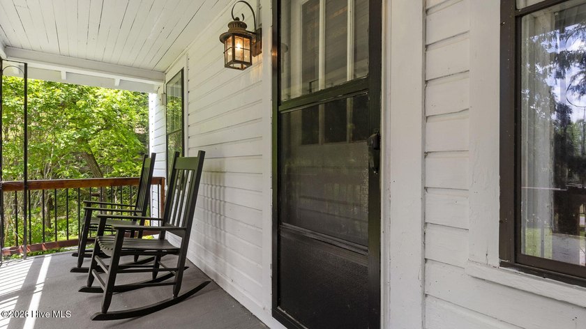 Discover a rare opportunity to own a charming 1940s mountain - photo 17
