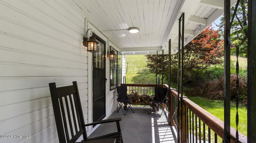 Discover a rare opportunity to own a charming 1940s mountain - photo 18