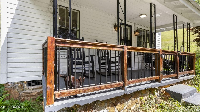 Discover a rare opportunity to own a charming 1940s mountain - photo 20