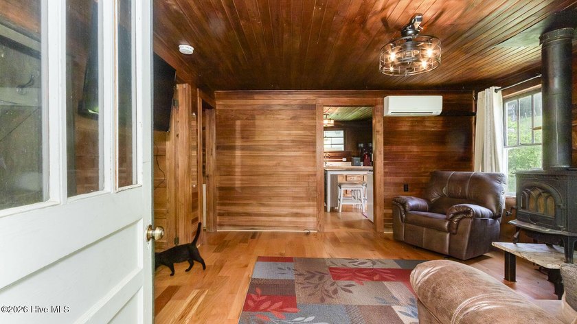 Discover a rare opportunity to own a charming 1940s mountain - photo 21