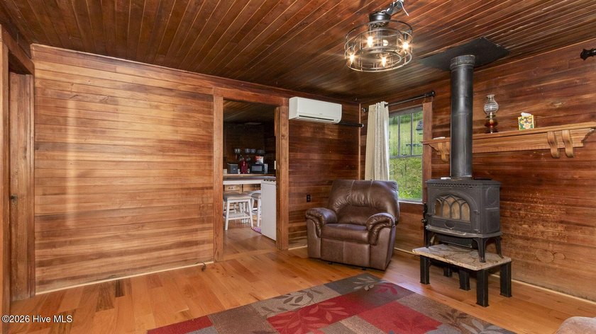 Discover a rare opportunity to own a charming 1940s mountain - photo 22