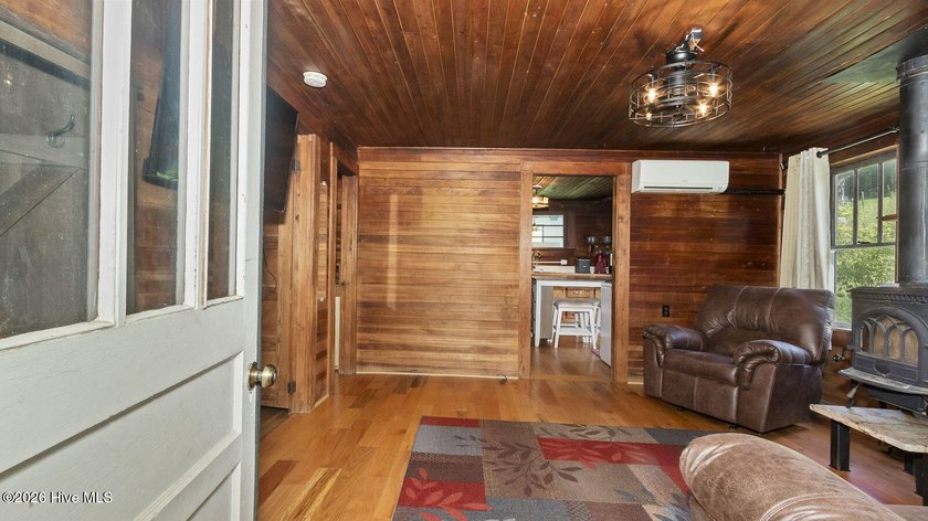 Discover a rare opportunity to own a charming 1940s mountain - photo 23