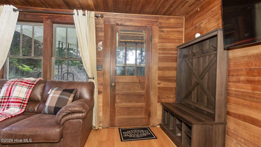 Discover a rare opportunity to own a charming 1940s mountain - photo 24