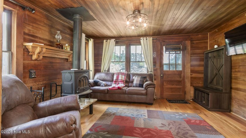 Discover a rare opportunity to own a charming 1940s mountain - photo 29