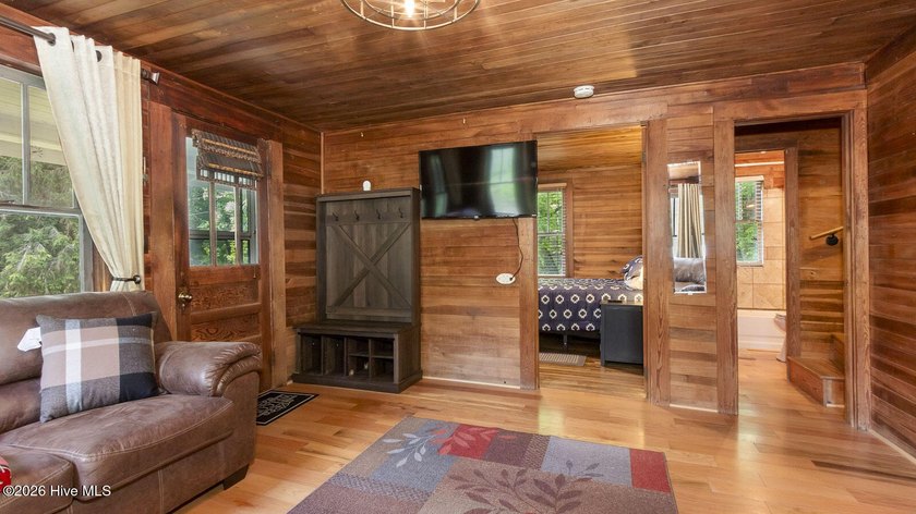 Discover a rare opportunity to own a charming 1940s mountain - photo 30