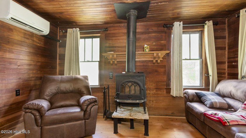 Discover a rare opportunity to own a charming 1940s mountain - photo 31