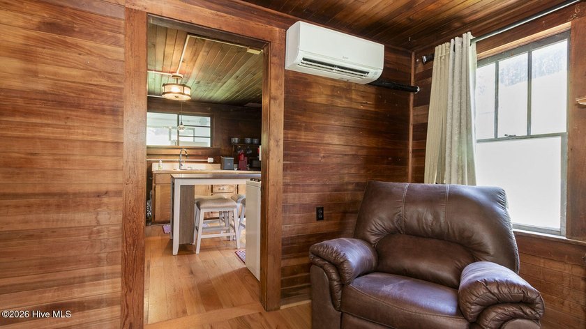 Discover a rare opportunity to own a charming 1940s mountain - photo 32