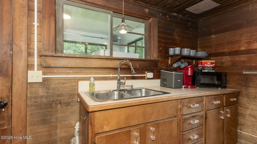 Discover a rare opportunity to own a charming 1940s mountain - photo 35