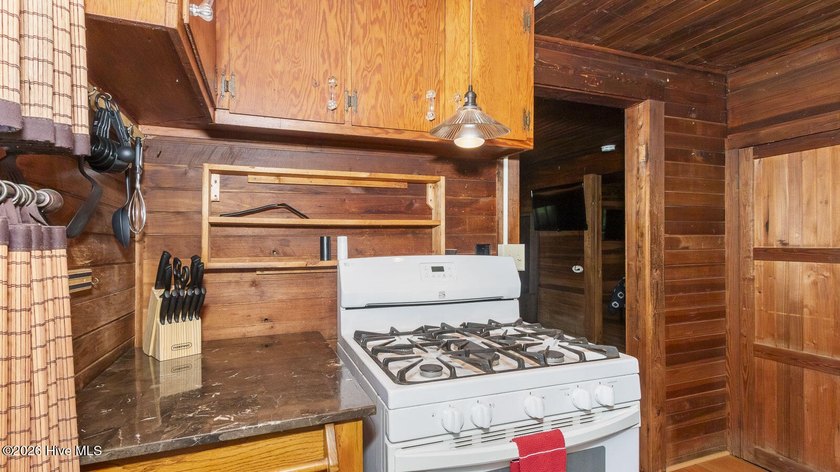 Discover a rare opportunity to own a charming 1940s mountain - photo 38