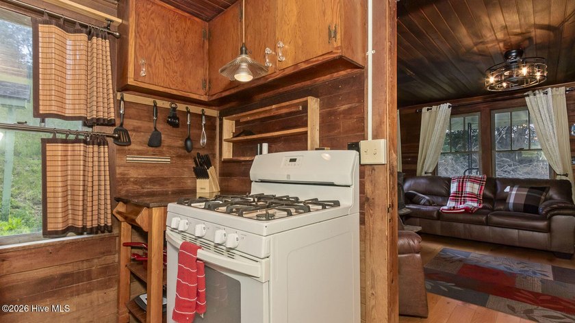 Discover a rare opportunity to own a charming 1940s mountain - photo 39