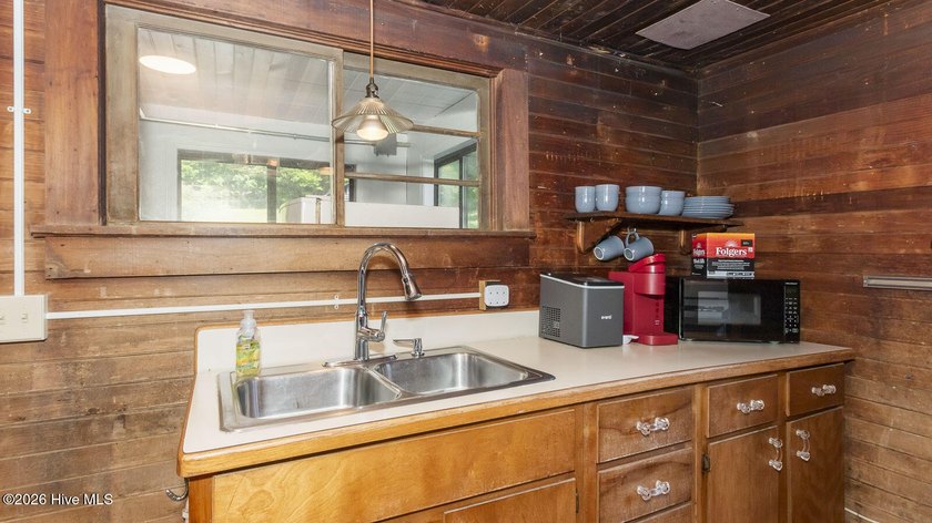 Discover a rare opportunity to own a charming 1940s mountain - photo 40
