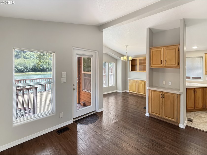RIVERFRONT living in this beautifully maintained 2-bedroom cabin - photo 3