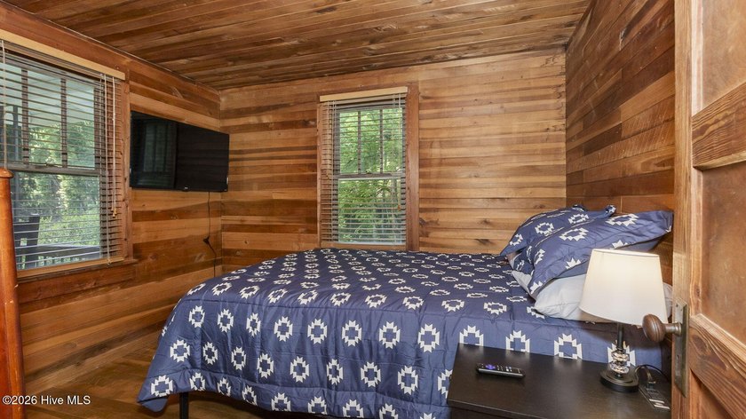 Discover a rare opportunity to own a charming 1940s mountain - photo 47