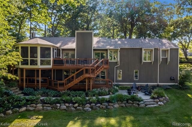 Welcome to 7148 Deerhill Drive! This striking contemporary ranch - photo 3