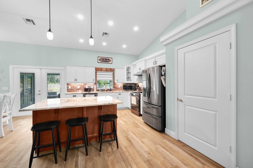 Welcome to this one-of-a-kind custom estate located in the - photo 23