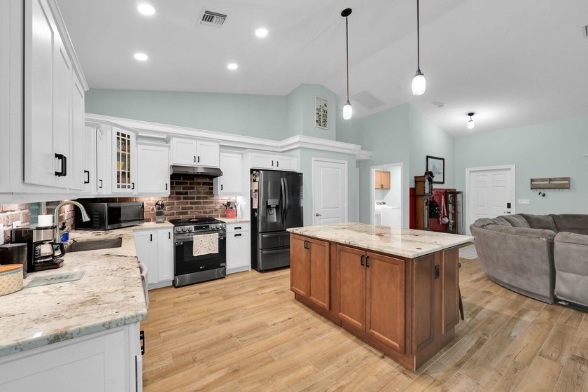 Welcome to this one-of-a-kind custom estate located in the - photo 24