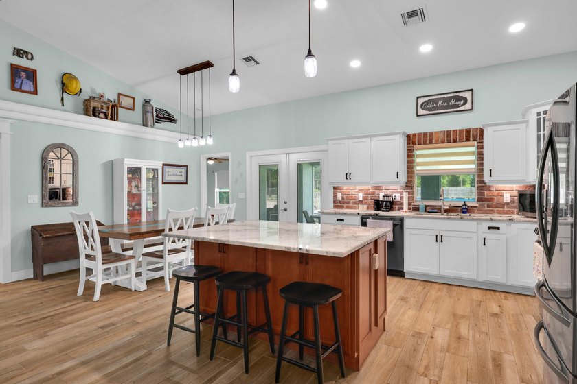 Welcome to this one-of-a-kind custom estate located in the - photo 26