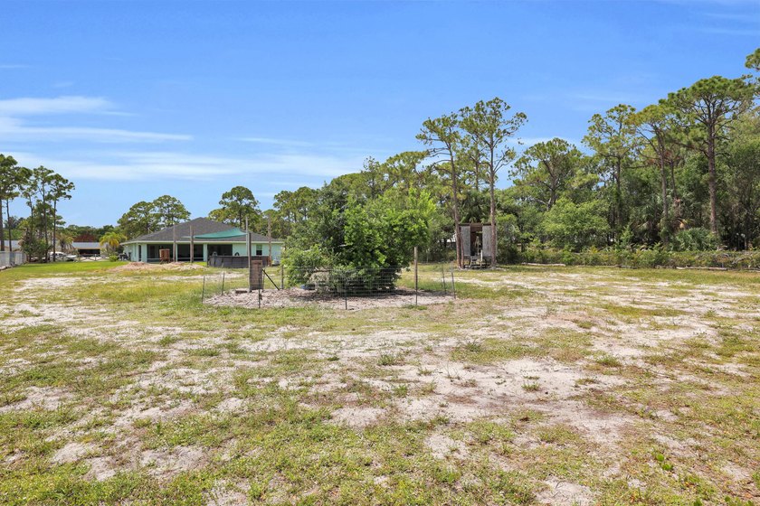 Welcome to this one-of-a-kind custom estate located in the - photo 33