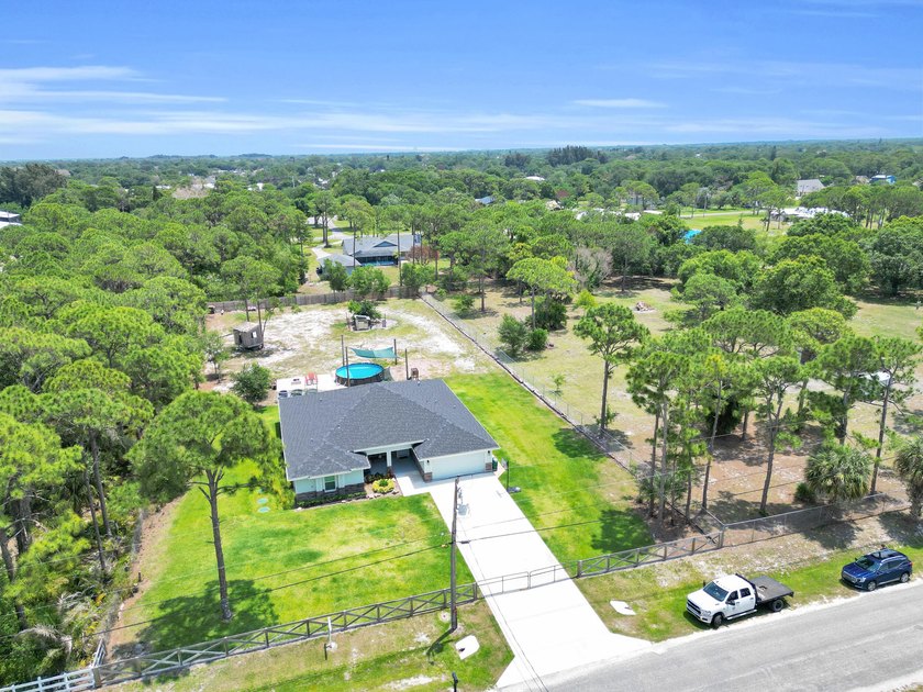 Welcome to this one-of-a-kind custom estate located in the - photo 39