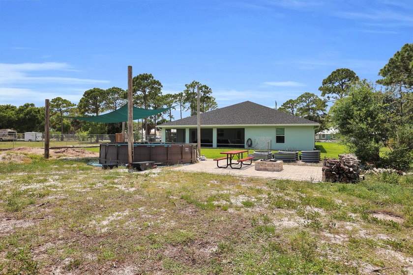 Welcome to this one-of-a-kind custom estate located in the - photo 50