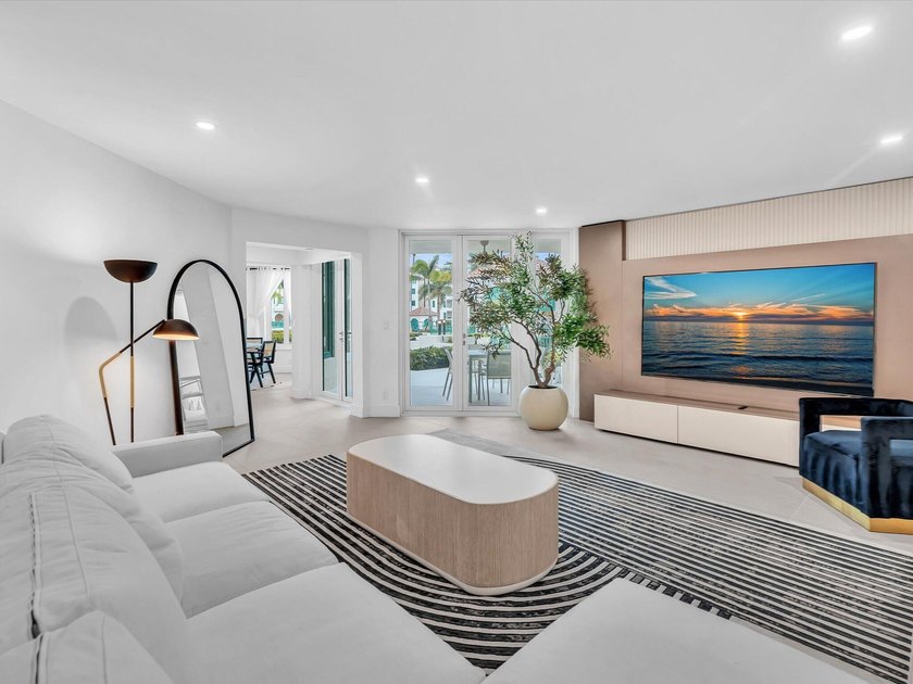 Welcome to luxury waterfront living in downtown Boca. This - photo 3