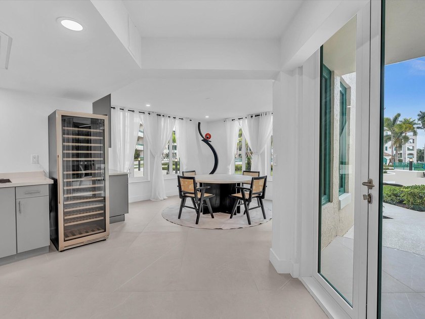 Welcome to luxury waterfront living in downtown Boca. This - photo 5