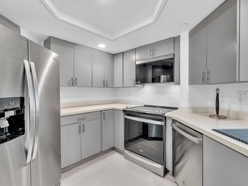Welcome to luxury waterfront living in downtown Boca. This - photo 7