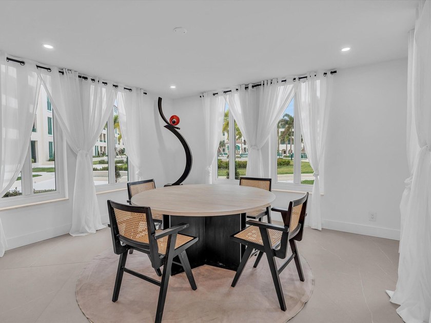 Welcome to luxury waterfront living in downtown Boca. This - photo 9