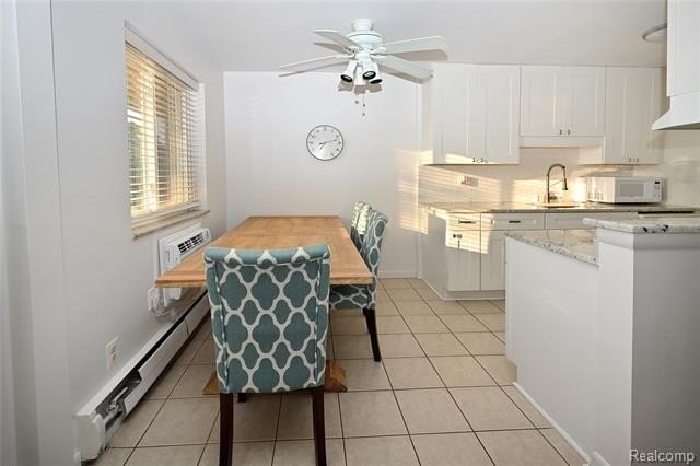Fourth-floor unit in a well-maintained co-op community, ideally - photo 7