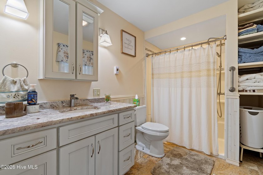 This renovated 3-bedroom, 2-bath ranch features a chef's kitchen - photo 22