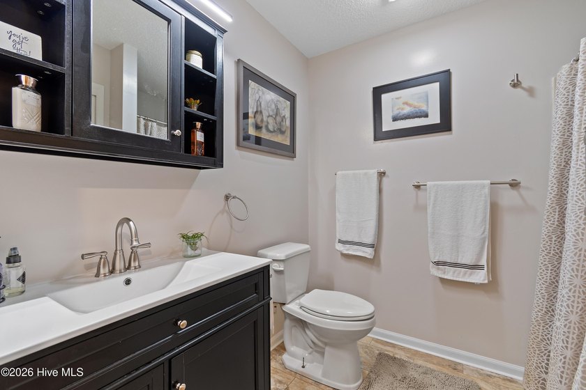 This renovated 3-bedroom, 2-bath ranch features a chef's kitchen - photo 25