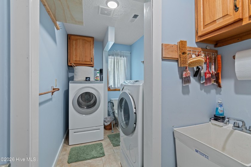 This renovated 3-bedroom, 2-bath ranch features a chef's kitchen - photo 29