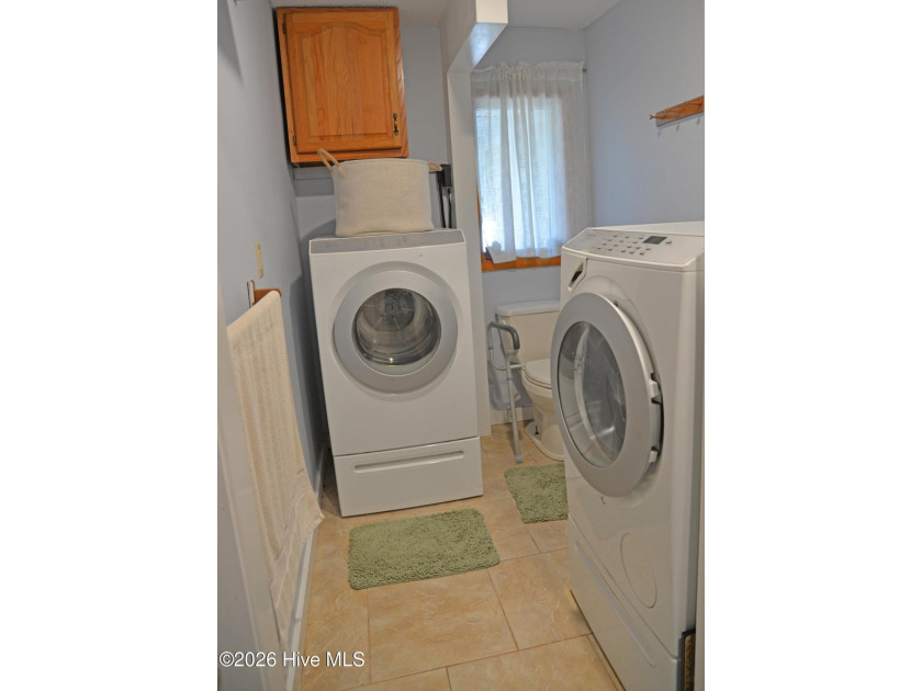 This renovated 3-bedroom, 2-bath ranch features a chef's kitchen - photo 30