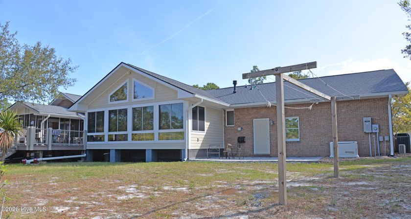 This renovated 3-bedroom, 2-bath ranch features a chef's kitchen - photo 35