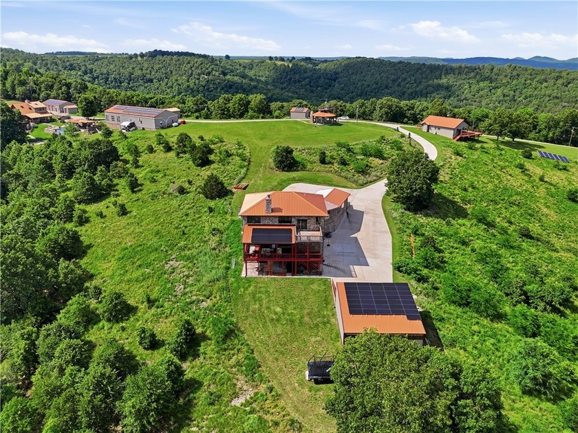 Perched on 7.22 acres within a secluded gated mountain setting - photo 2