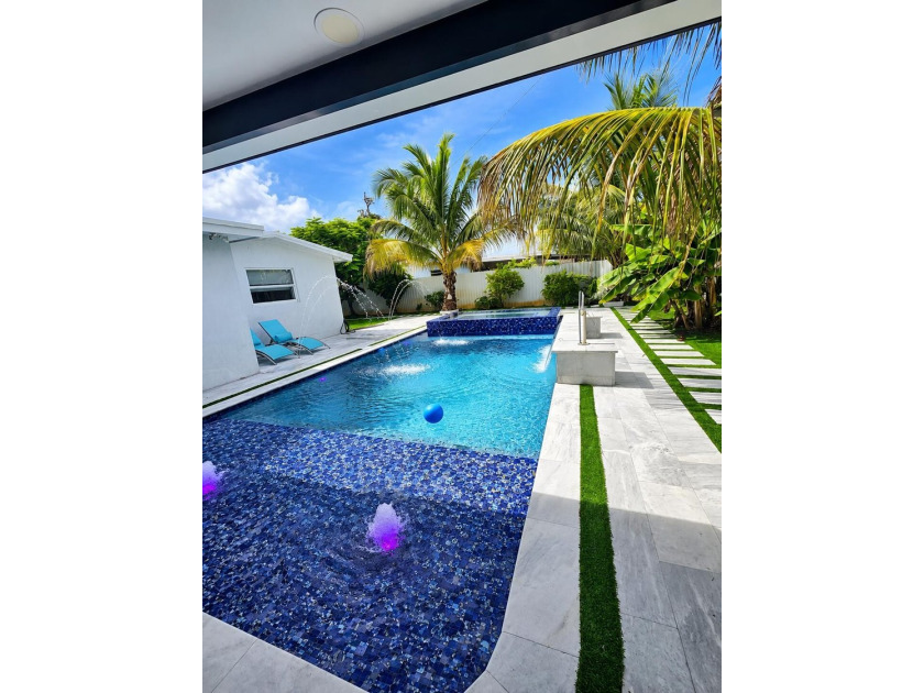 Welcome to this beautifully maintained 4-bedroom, 2-bathroom - photo 2