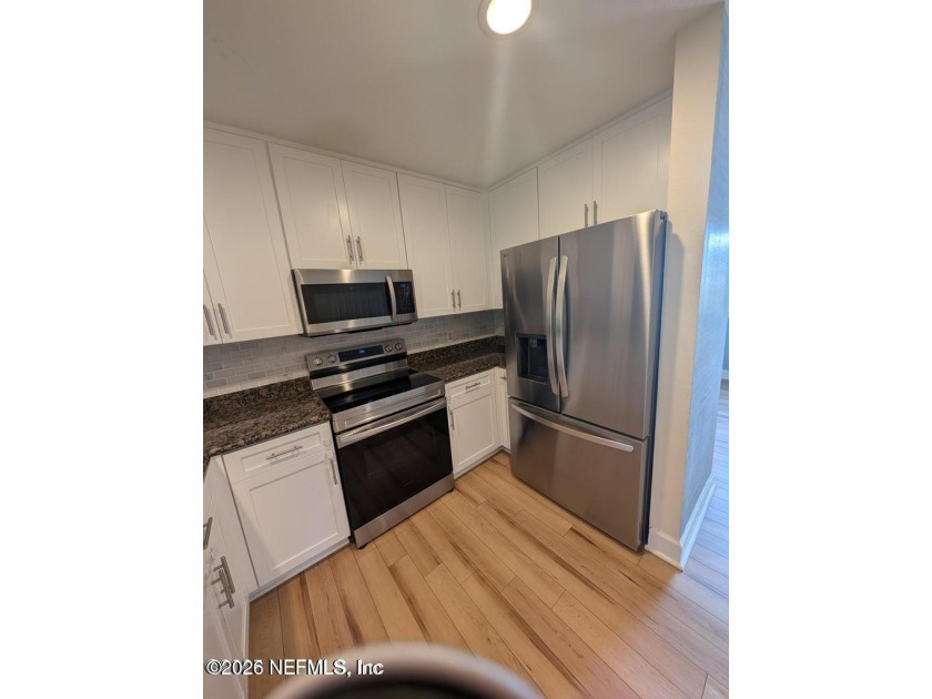 Beautiful 2 bedroom 2 1/2 bath condo is located in the desirable - photo 2