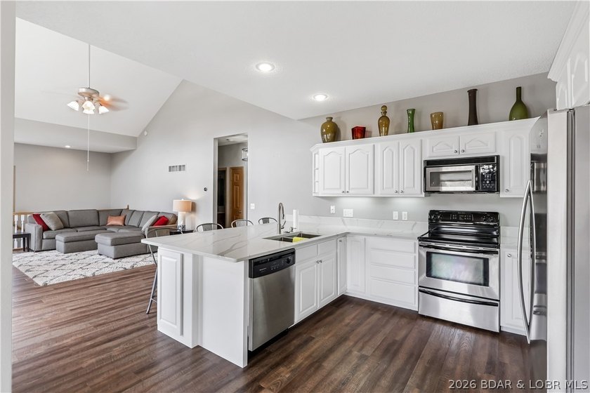 Enjoy the ultimate Lake of the Ozarks lifestyle in this - photo 12