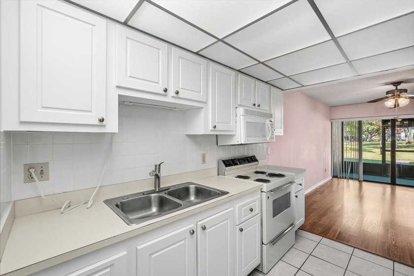 Welcome to maintenance-free Florida living at its finest! This - photo 7