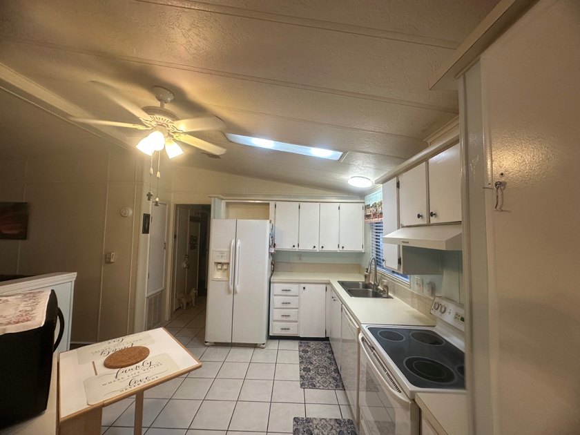Welcome to this charming 1,248 sq ft home located in the - photo 3