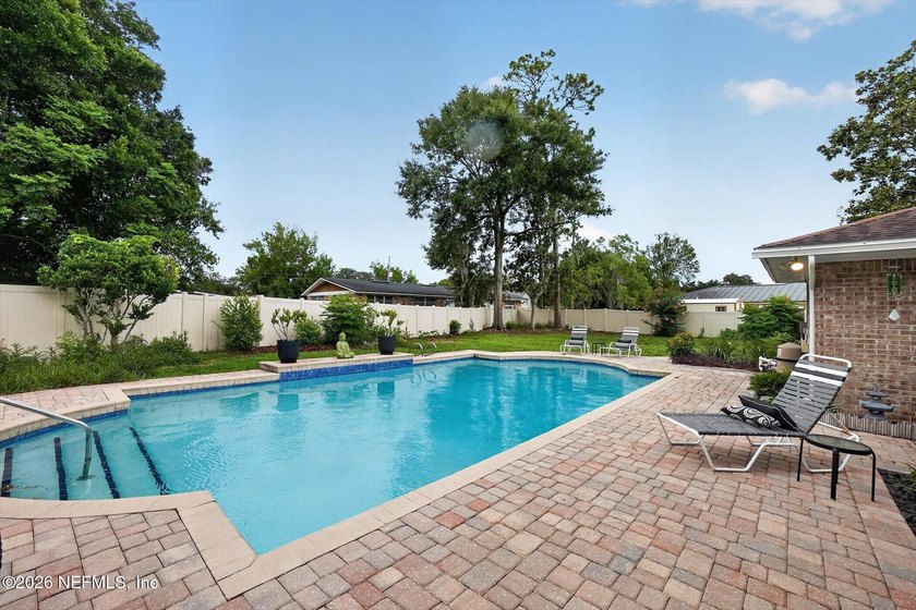 Welcome to 8620 San Servera Drive W, a beautifully updated - photo 4