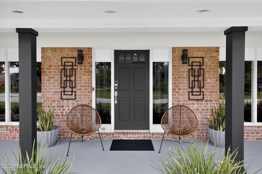 Welcome to 8620 San Servera Drive W, a beautifully updated - photo 5
