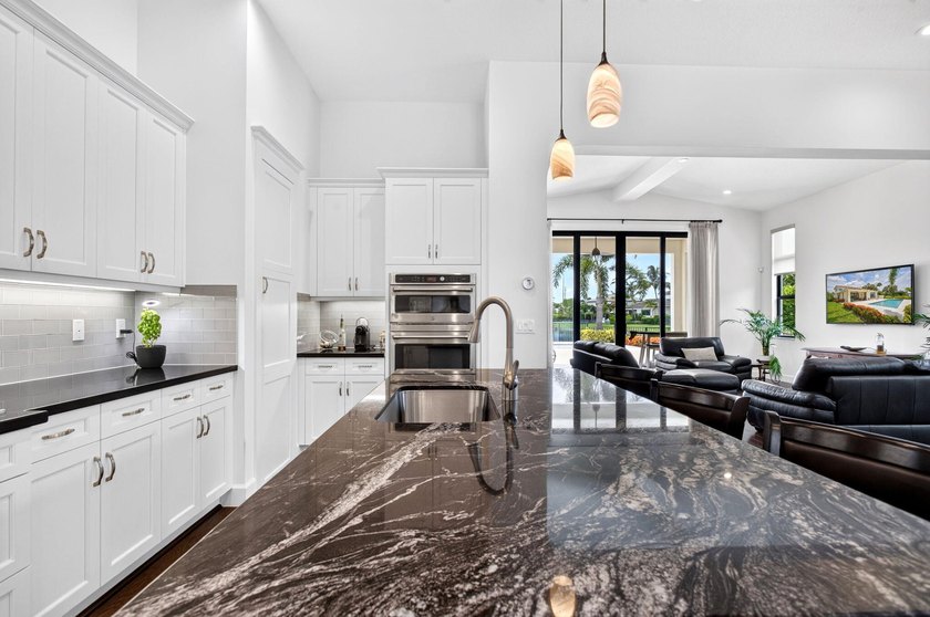 Welcome to luxury living in the prestigious, gated enclave of - photo 6