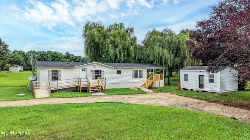 Completely remodeled inside and out, this move-in ready home on - photo 2