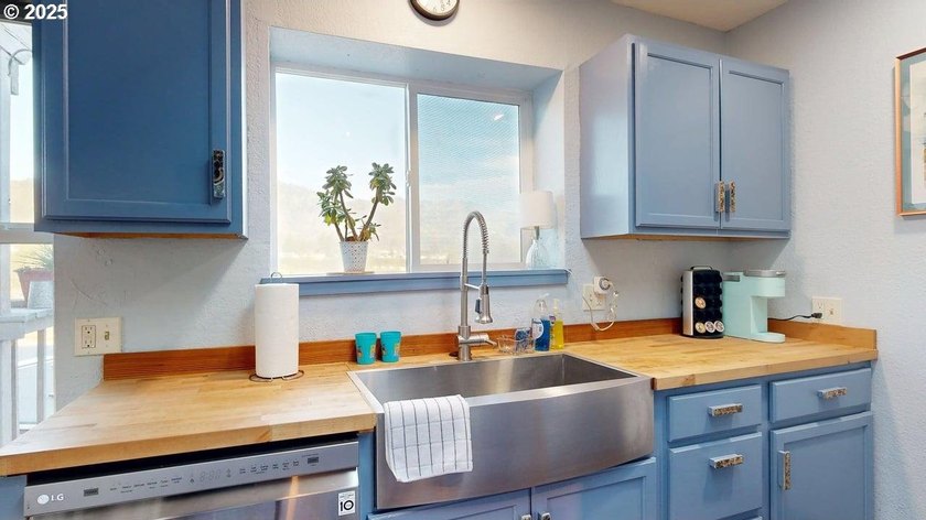 This furnished two-story condo near the Chetco River is move-in - photo 12