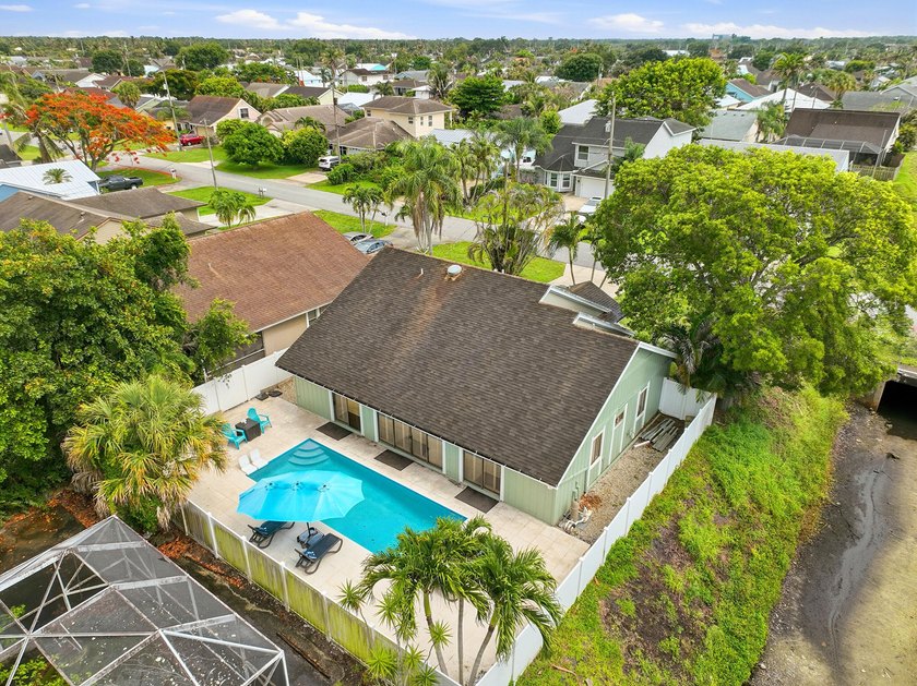 Welcome to this charming single-story residence in North Palm - photo 36