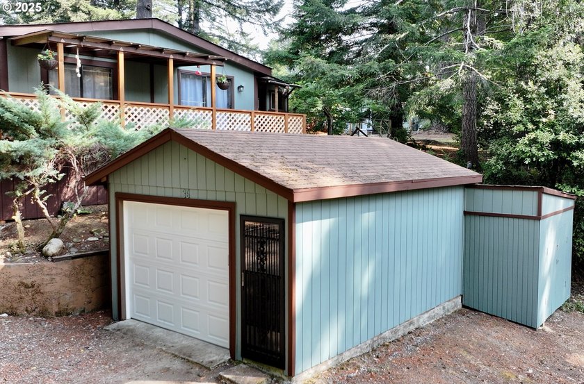 Tucked into a peaceful, wooded setting, this restored 2-bedroom - photo 3