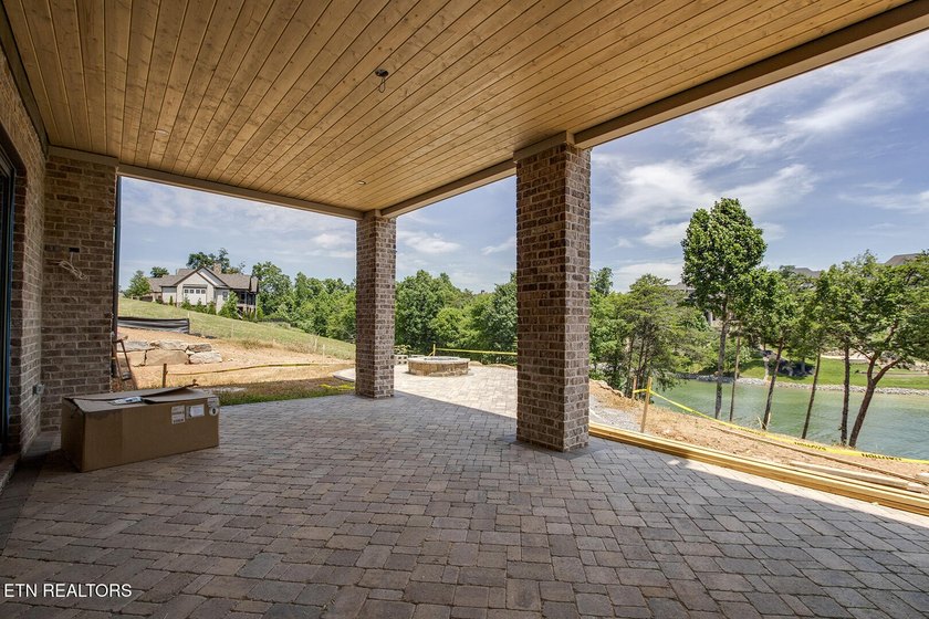 Nearly completed new construction on a premier lakefront - photo 13