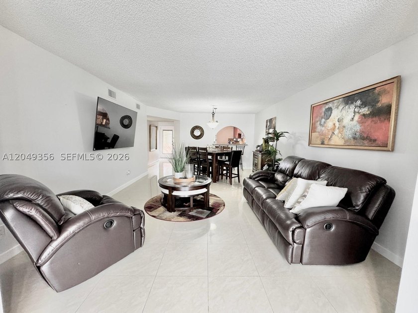 Beautifully Updated &amp; Move-In Ready! Welcome to this spacious - photo 6